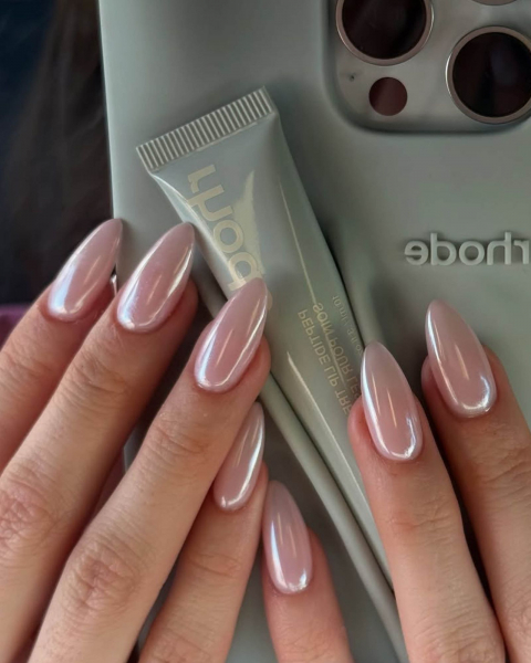 Shimmery pearly nails on a min green Rhode phone case.