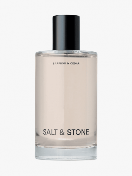 Salt & Stone Saffron & Cedar Body Mist in branded component on a light gray background